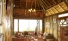 [Image: Bamboo house]